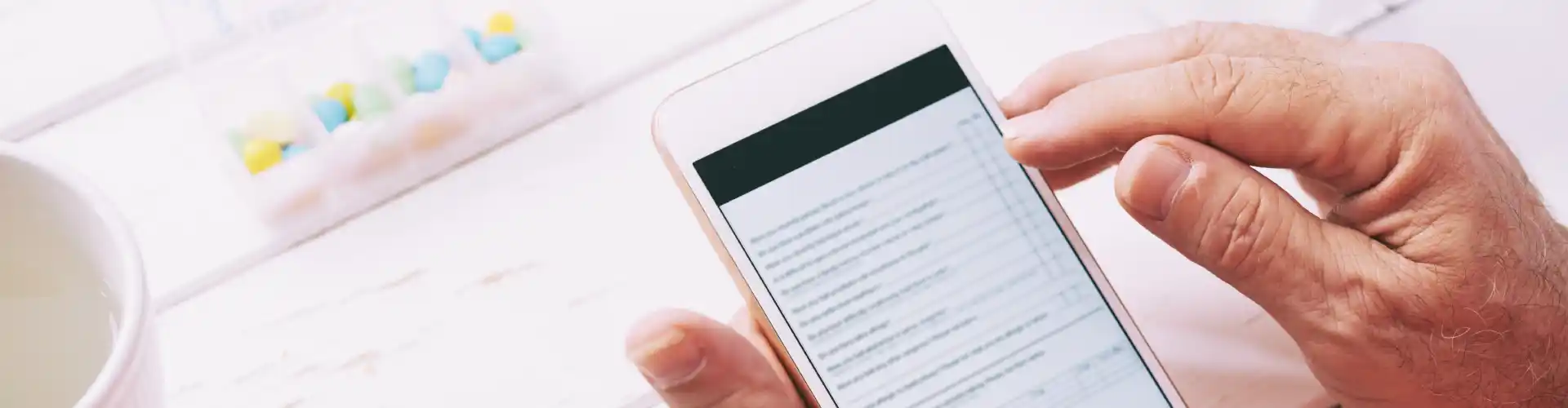 Patient checking an electronic prescription expiry reminder notification on a smartphone in Australia