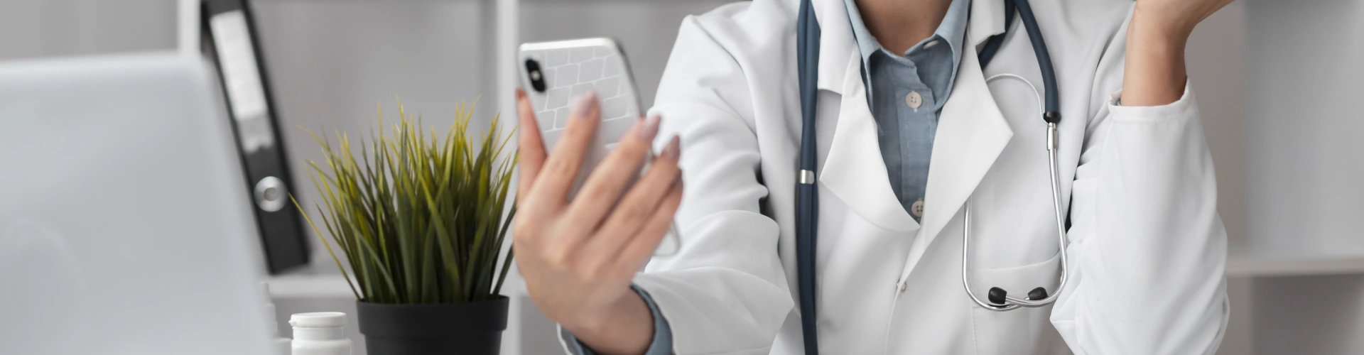 Patient requesting a repeat prescription through a telehealth consultation on a smartphone at home